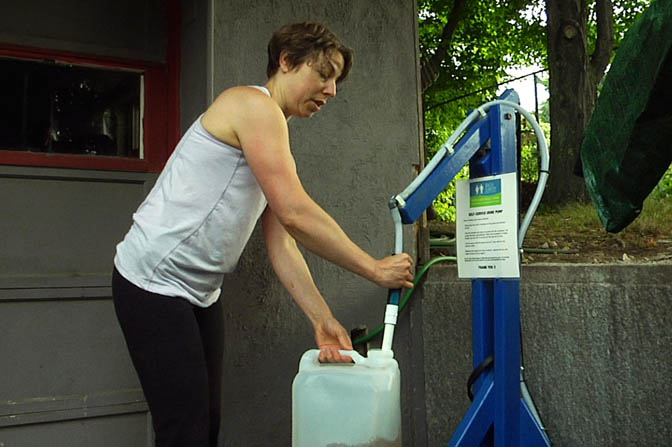 Julia Hampton deposits her and her partner's urine at the "urine depot" of the Rich Earth Institute in Bratterboro, Vt.