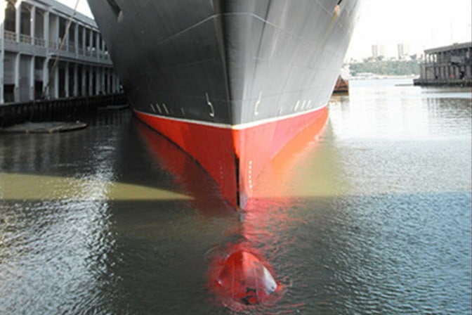 The famous Queen Mary 2 in the water with the bulbous bow visible