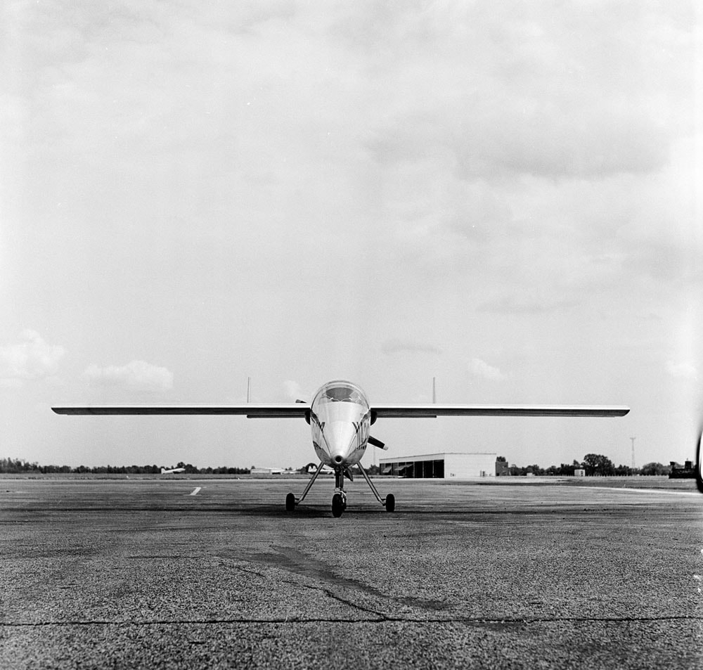 Black and white photo of the front view of the Teal on a large tarmac.