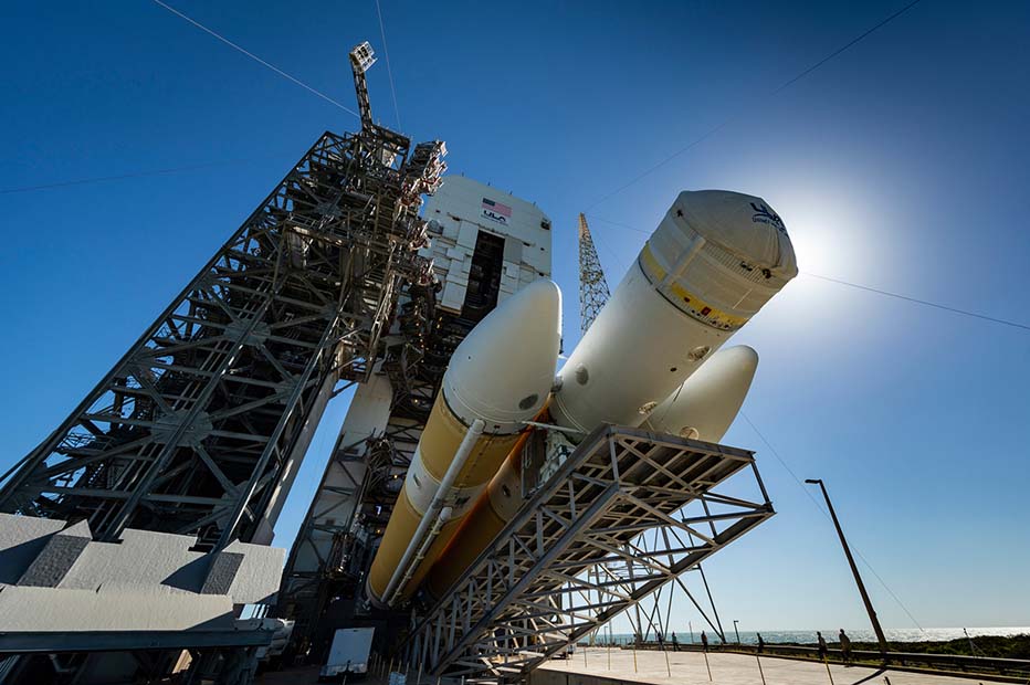 Large rocket on launchpad being prepared for launch