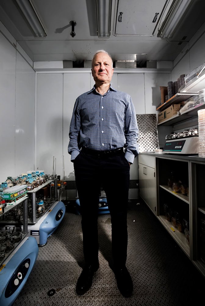 A full shot of David Sherman standing in the lab