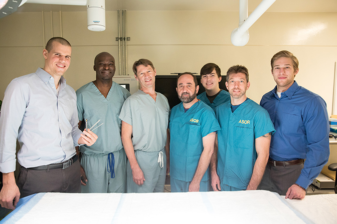 a group photo of the everter team members jeffrey plott, adeyiza momoh, paul cederna, hakam tiba, brandon cummings, brendan mccracken and jon zwier