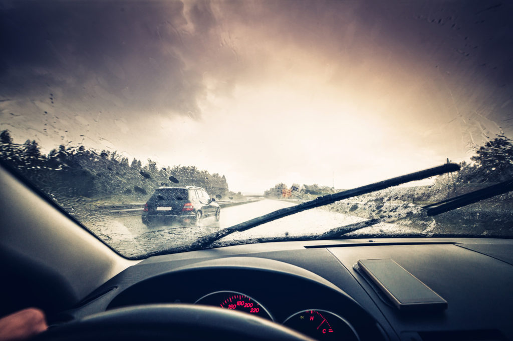 Car driving in the rain