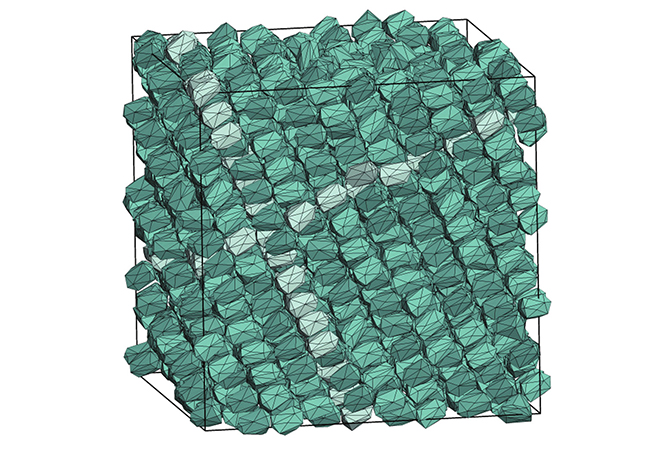 An outline of a cube with teal atoms arranged inside.