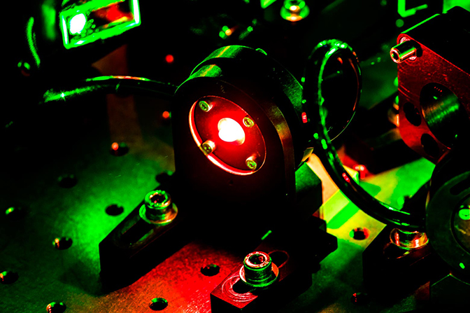 A device with led and green lasers.