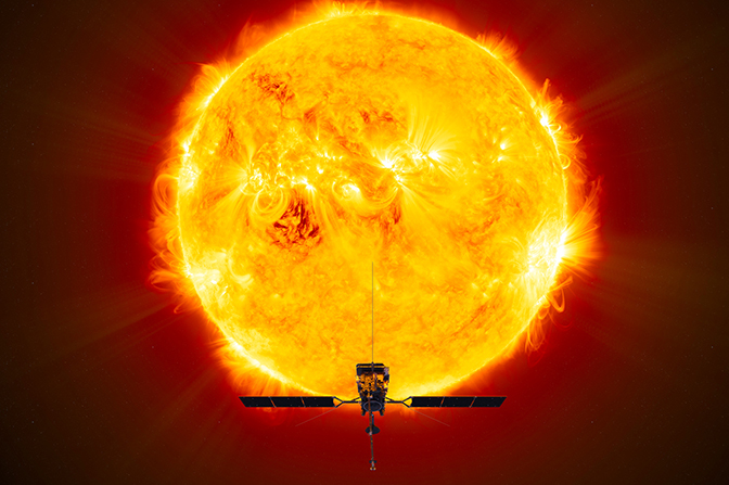 A satellite in front of the sun.