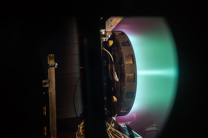 a side shot of the x3 thruster for mars mission firing at 50 kilowatts