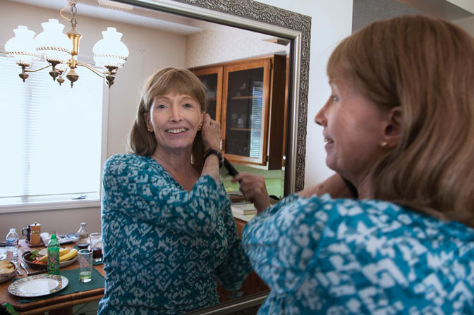 lynn conway looking in a mirror