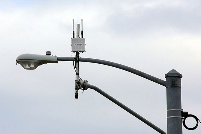 Close up image of streetlight that enables vehicles to communicate with one another and their surroundings