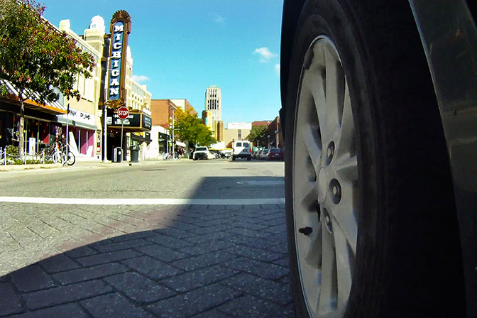 An image from the perspective of a camera attached to a driving car around Ann Arbor