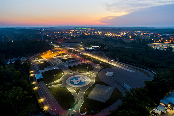 A birds eye view of Mcity Test Facility with a sunrise