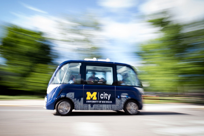 An image of Mcity Driverless Shuttle in motion