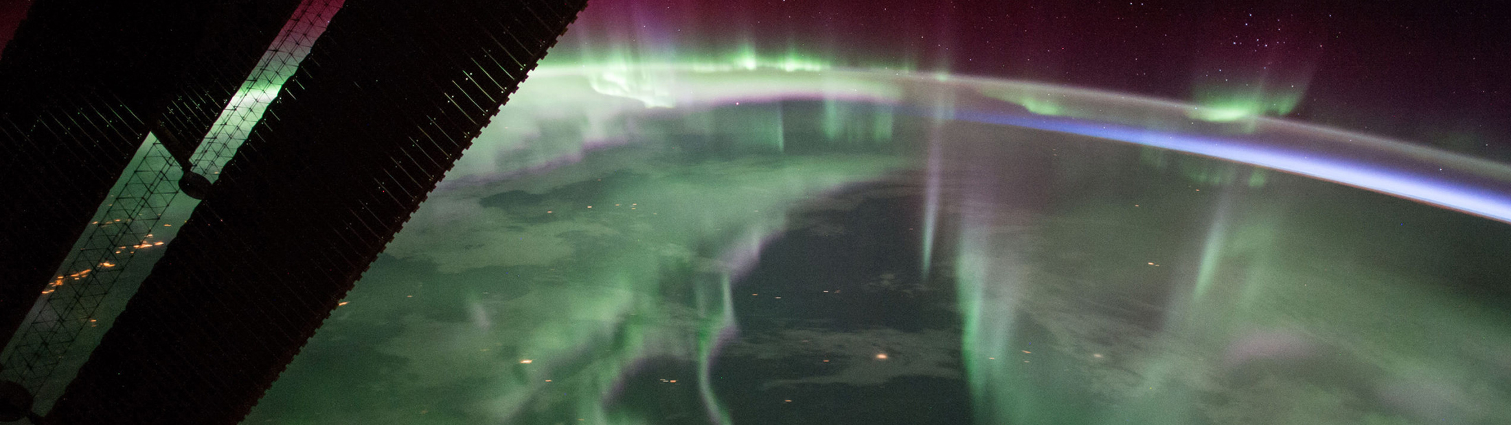 the ISS overlooks aurora borealis