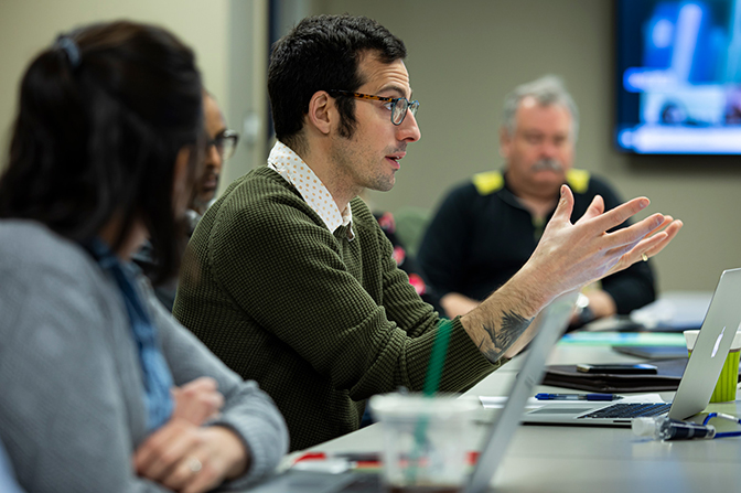 Image of Jesse Capecelatro speaking during a meeting