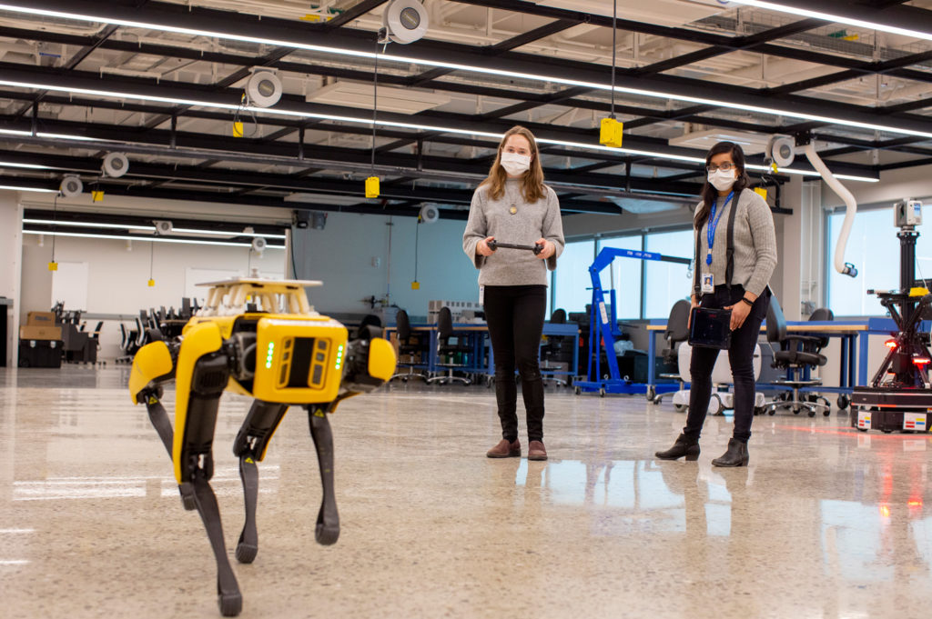 Spot, a four-legged robot, moves across Ford's fourth floor lab inside the Ford Robotics Building. Photo: Ford Motor Company