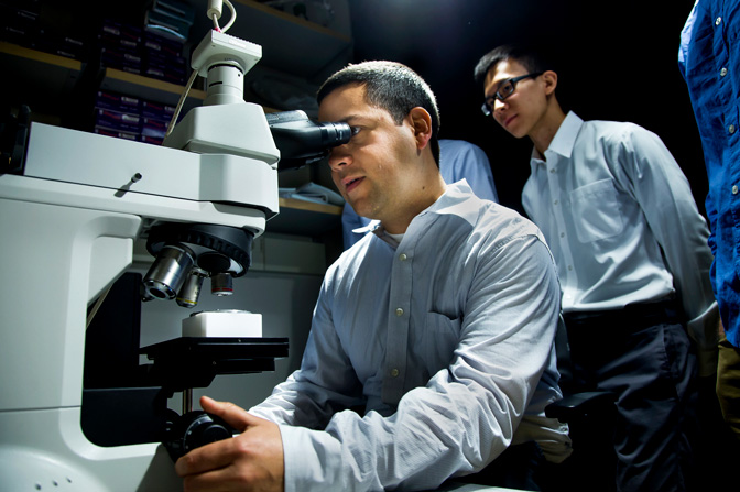 A visualization cell allows Neil Dasgupta, a U-M assistant professor of mechanical engineering, to view how dendrites form in lithium-ion batteries. Dendrites are a safety issue for today’s standard EV batteries. Photo: Joseph Xu/Michigan Engineering