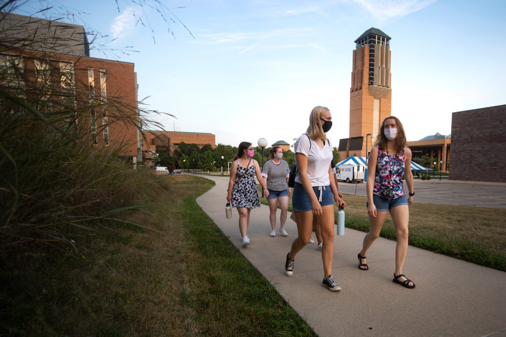 A group of Women in Science and Engineering (WISE) program members hang out on the Eda U. Gerstacker Grove on North Campus. Photo: Joseph Xu/Michigan Engineering