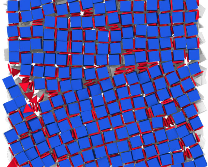 Computer simulations identified the conditions under which nanoscale cubes would self-assemble into a grid, incorporating flat triangular shapes between them. This technique could help enable new kinds of materials with new properties. Credit: Glotzer Lab, University of Michigan.