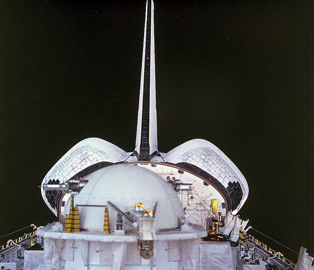 The deployment of the Tethered Satellite System 1 (TSS-1) by the space shuttle Altantis in 1992.