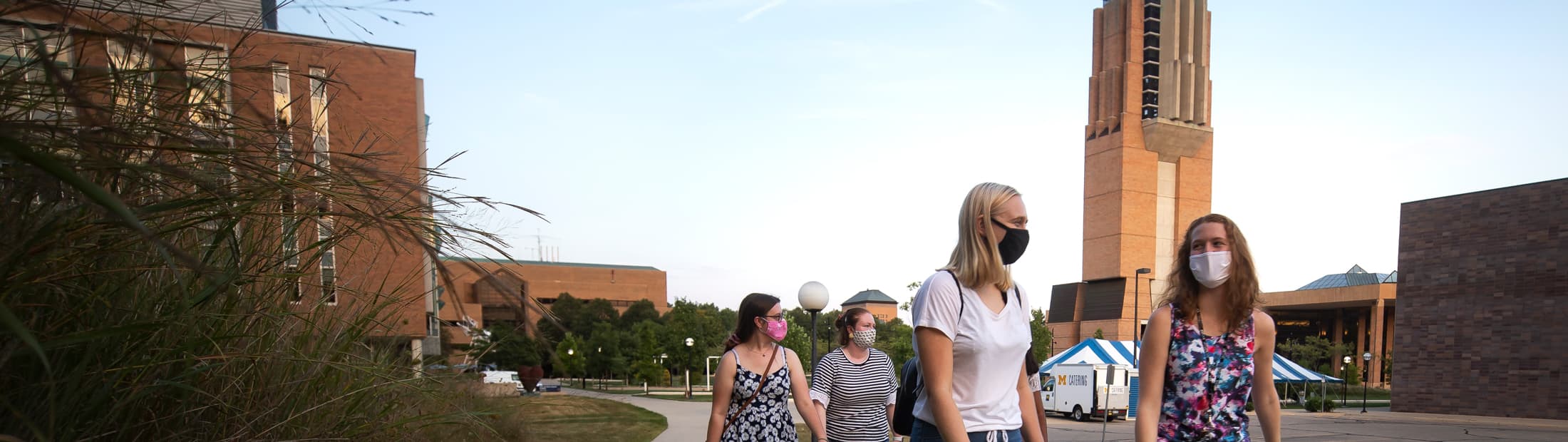 A group of Women in Science and Engineering (WISE) program members hang out on the Eda U. Gerstacker Grove on North Campus of the University of Michigan in Ann Arbor, MI on August 27, 2020.