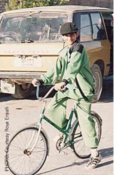 Young Roya Ensafi on a bike in her neighborhood
