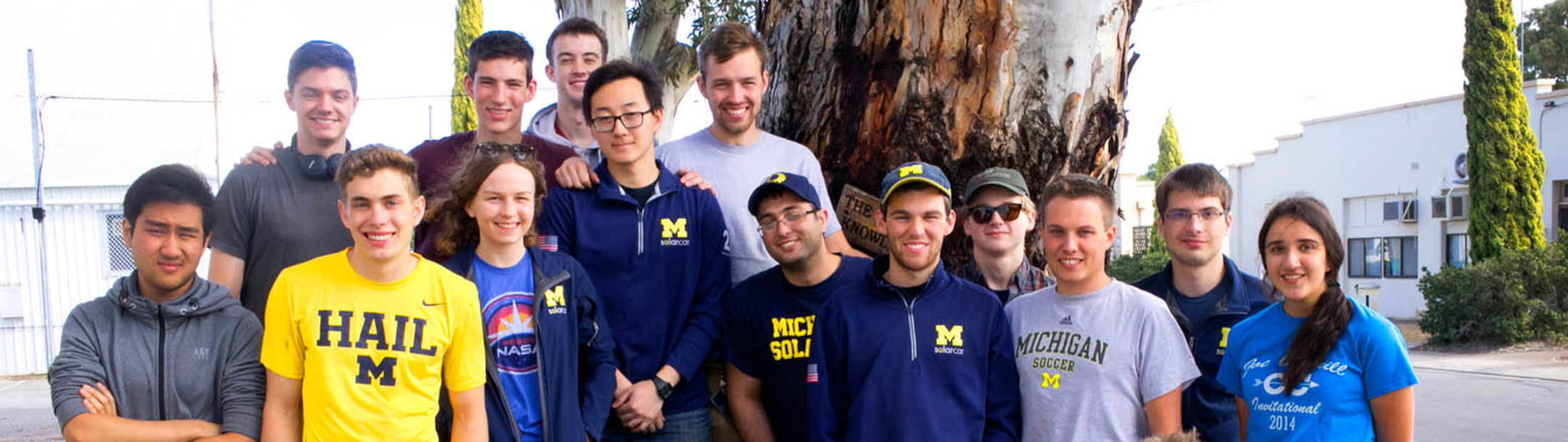 A group picture of students in Michigan apparel.