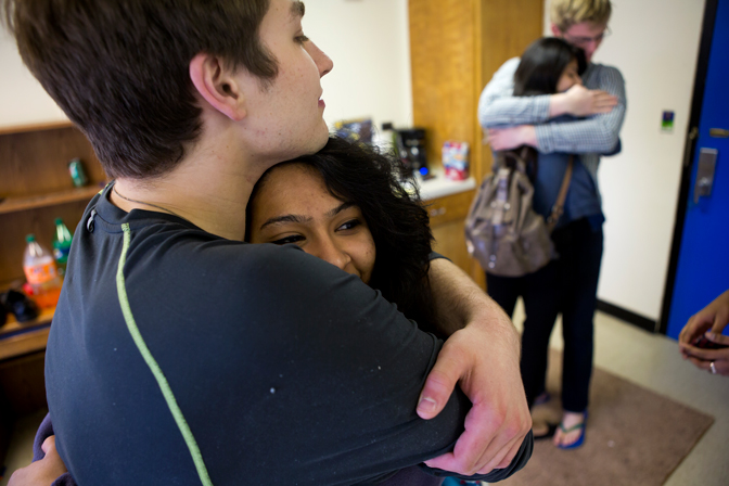 Students hugging goodbye