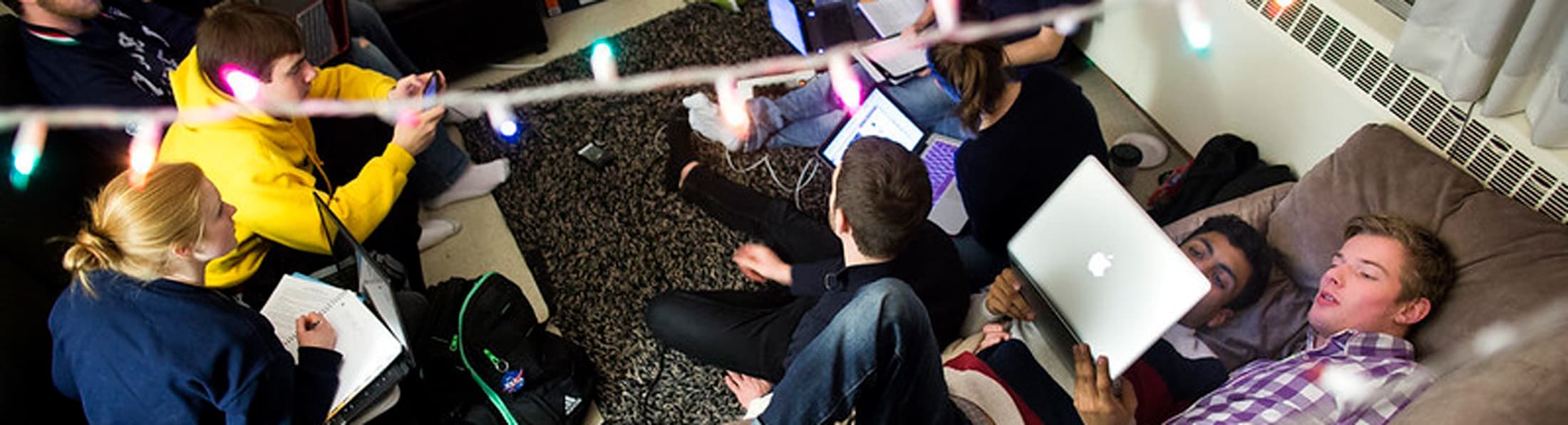 students relaxing in a dorm room