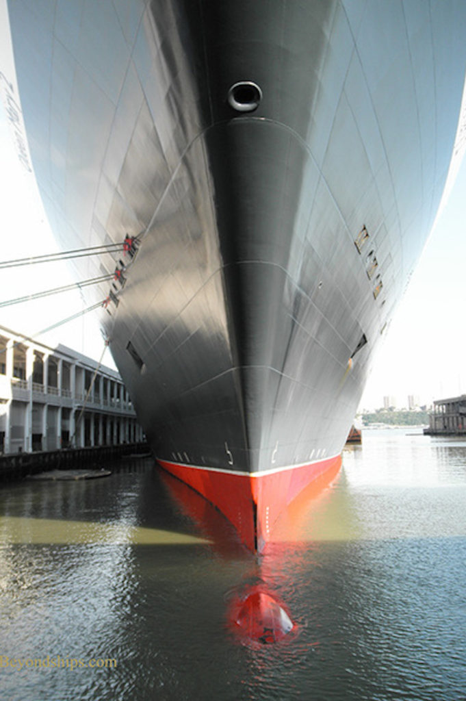 The famous Queen Mary 2 in the water with the bulbous bow visible