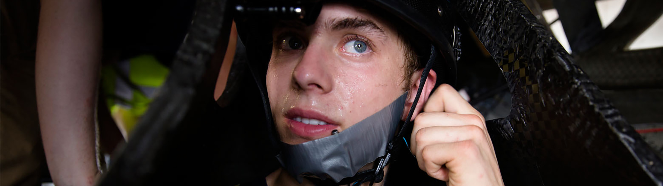 Close up image of the Novum driver Nate Silverman sweating after driving