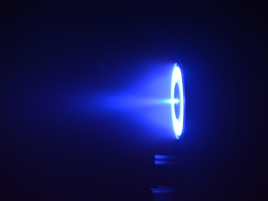 A deeper blue flare in a dark room
