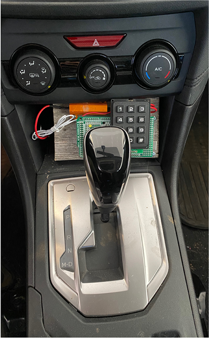 Driver controls and gear shift wired into a prototype of the Battery Sleuth device