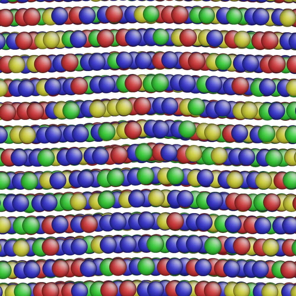 Colored circles represent atoms of different metals in this model simulation of an alloy. Some rows of metal atoms in the alloy's structure are bending due to natural imperfections in the alloy's structure. How these imperfections move under stress and strain could impact an alloy's strength, which is why the collaborative research team is visualizing them with both microscopy and simulations to train their machine-learning model how to predict alloy strength.
