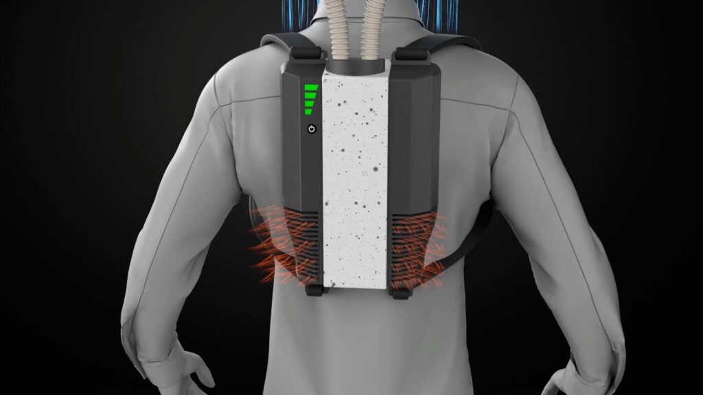 An animation screenshot shows a simulated worker wearing a hardhat connected by two air tubes to a backpack that houses the device’s cold plasma module. Air is shown flowing downward from the brim of the hat.