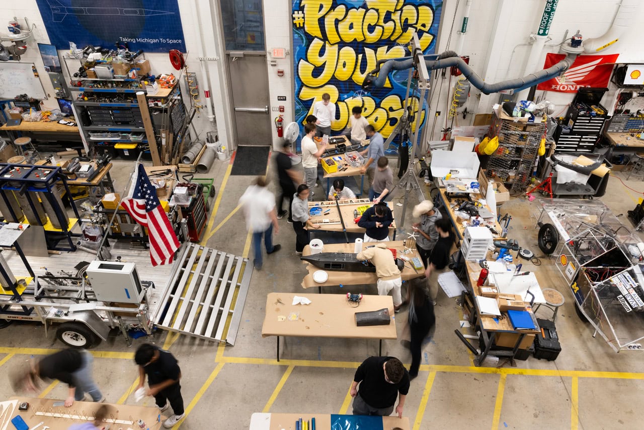 A long exposure photograph showing students working in the wilson center