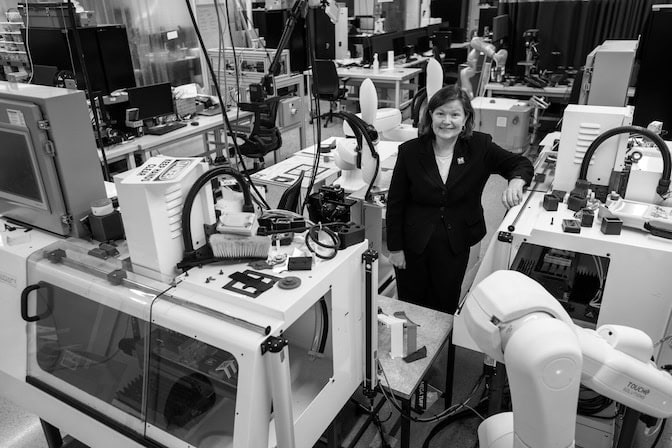 Dawn Tilbury poses in the robotics lab.