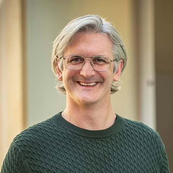 Portrait of Alec Thomas. 