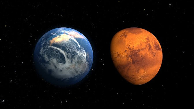A globe on the left has oceans of blue with green and orange continents and swirling, white clouds. A globe on the right is shades of rusty red and orange.