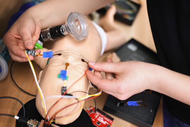 Sensors are placed across the face of an infant manikin