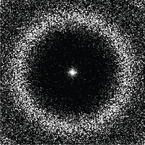A white point on a black field is surrounded by many small points that create a halo-like pattern, also in white.