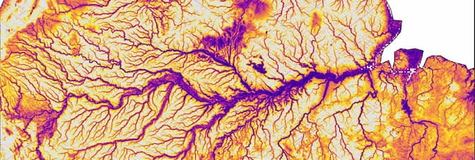 The Amazon River looks like a branching purple vein cutting across the South American continent, colored in shades of yellow and orange. Patches of purple are also visible around the continent.