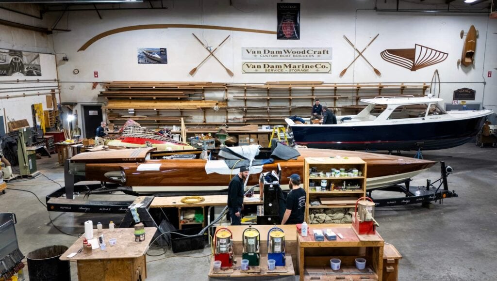  An overhead view of the Van Dam Custom Boats workshop, where boats are being restored. 