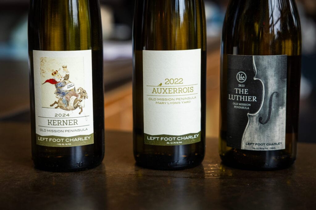 Three bottles of wine produced from grapes grown at Lyon Farm & Vineyards.