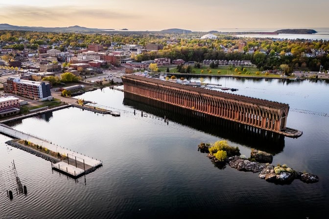 Aerial view of the historic ore dock and waterfront in downtown Marquette along Lake Superior.